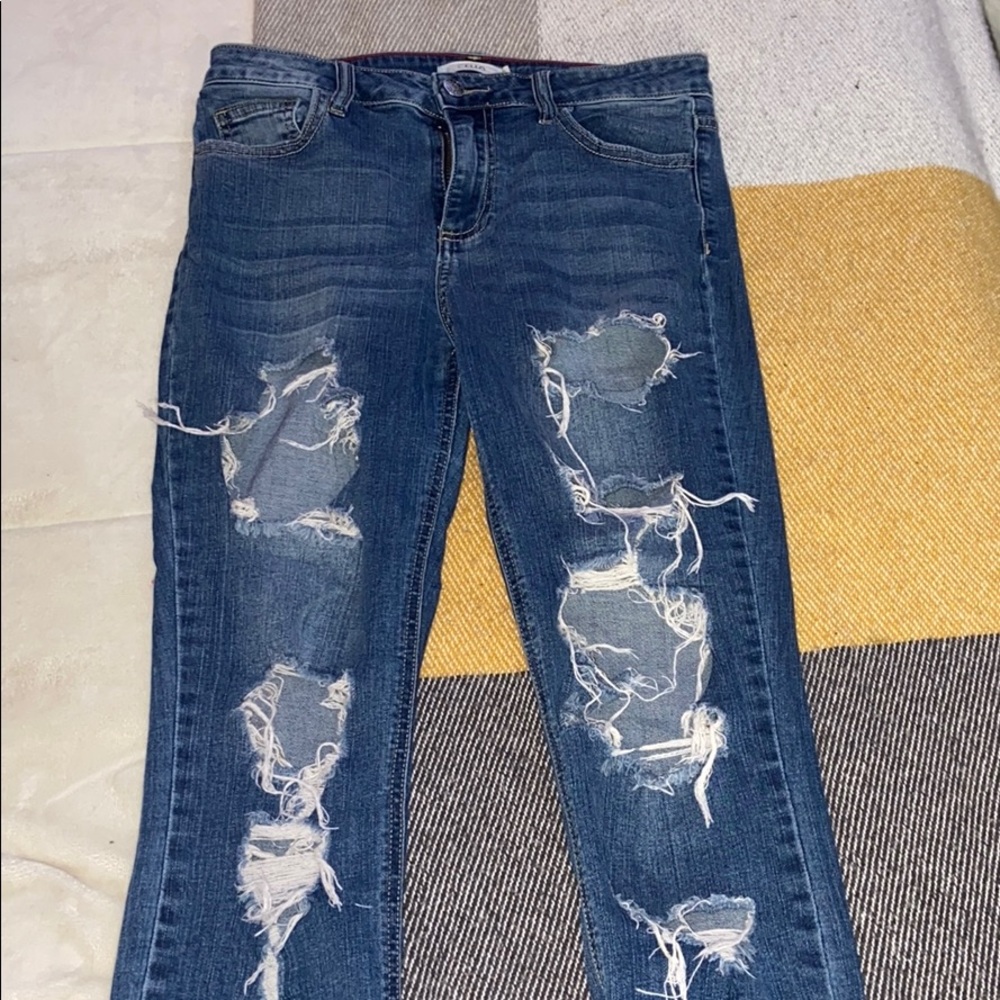 Distressed Blue jeans